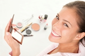stock-photo-makeup-woman-cute-cosmetics-woman-having-fun-with-make-up-products-45360226